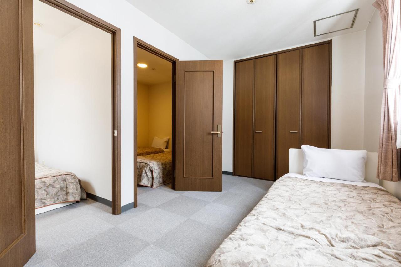 Tabist Condominium Hakuba Goryu Екстер'єр фото