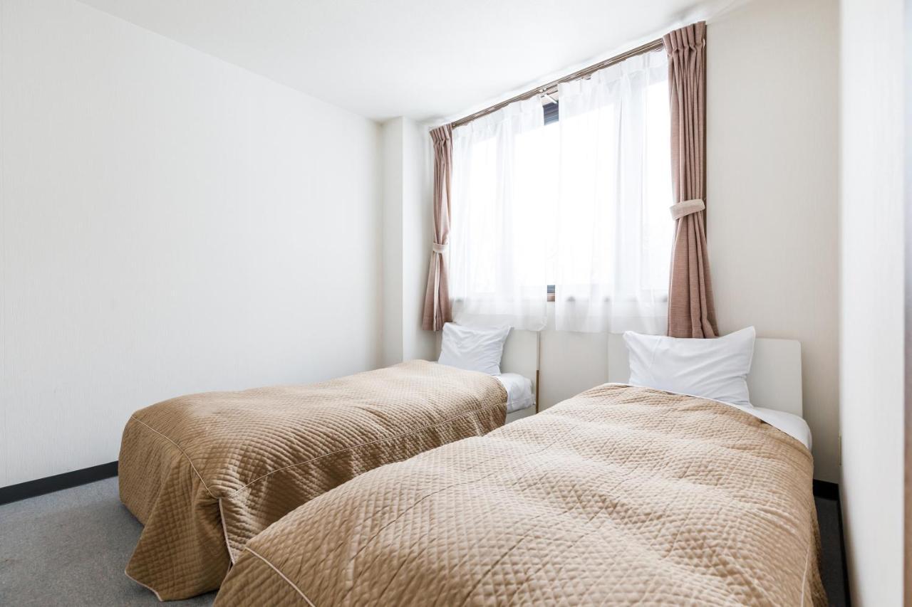 Tabist Condominium Hakuba Goryu Екстер'єр фото